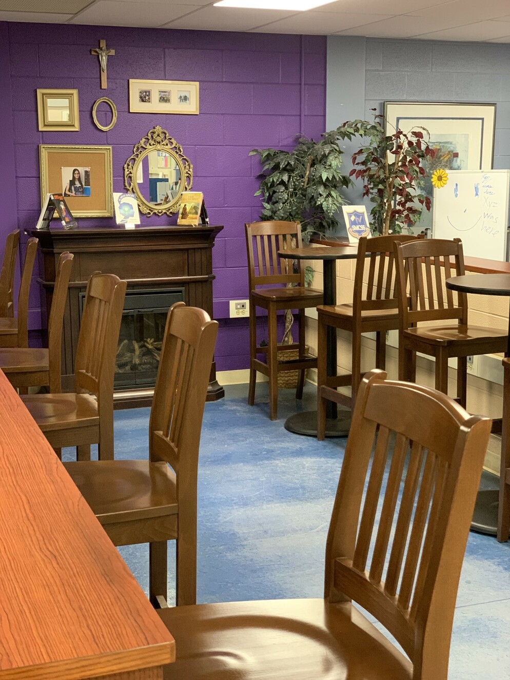 Picture or chairs and tables in a library
